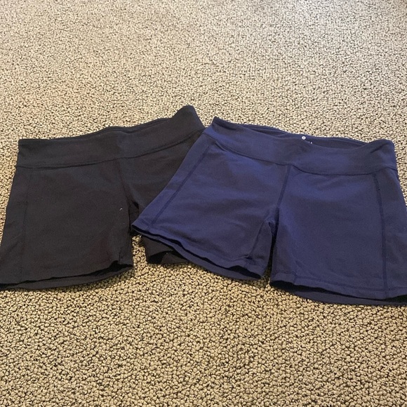 2 Pairs of Athleta Bike Shorts Black & Navy Blue Size Small in EUC - Picture 1 of 6